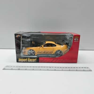 Jada Toys Import Racer 1:24 Scale Toyota Supra Yellow Diecast Car Model Boxed