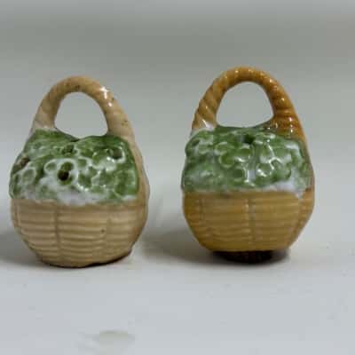 Two Minature Salt and Pepper Shakers. Basket of Flowers. 