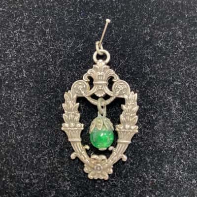 Vintage silver colour pendant with green stone 