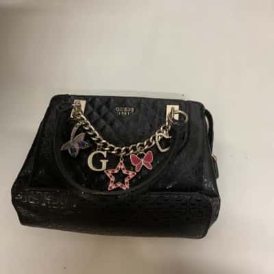 Womens guess handbag with gold hardware and charms 