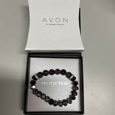 Avon Womens protection beaded Bracelet Purple and silver tones