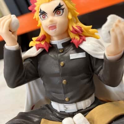 Demon Slayer Rengoku Kyojuro with onigiri figurine