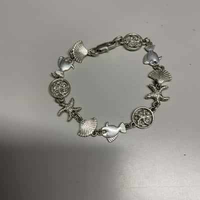  Womens charm Bracelet Silver plate base metal 