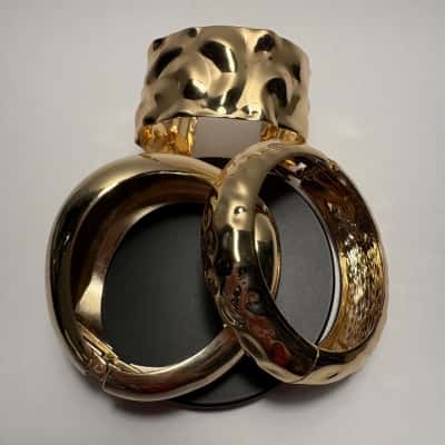 Collection of 3 Gold Tone Hinged Bracelet & Cuff