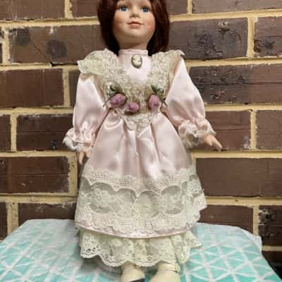 Vintage Porcelain Doll On Stand With Pink Lacy Dress
