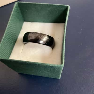 Men’s black hematite tungsten ring.