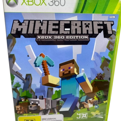  Minecraft: Xbox 360 Edition in its original green-trimmed case with a PAL regional rating label.