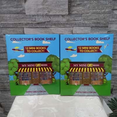 collector kids bookshelf x2 QBD AS IS one book missing