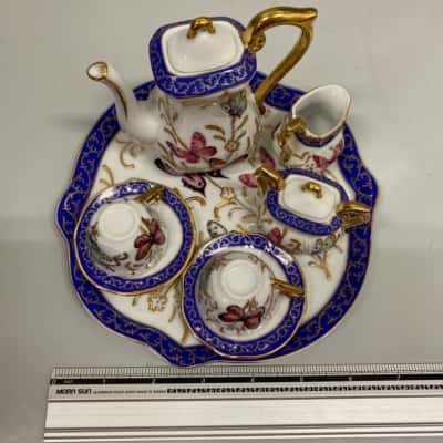 Miniature 8 Piece Teapot Set With Butterfly Pattern And Gold Trim
