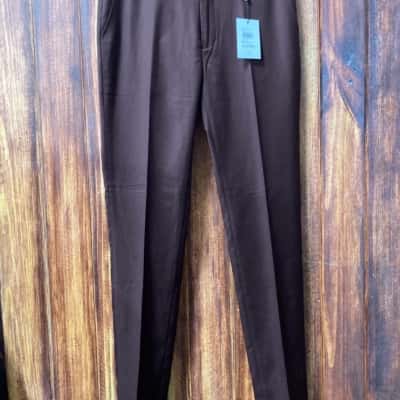 Yd.   Size 33 rust colour skinny pants new 