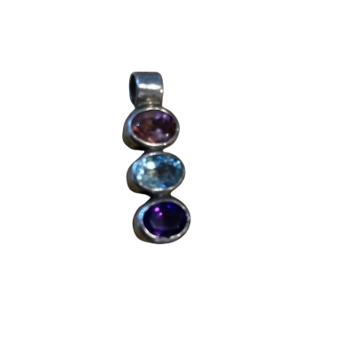 925 stamped silver pendant featuring three oval faceted stones.