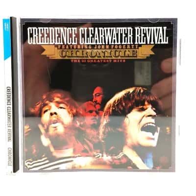 Creedence Clearwater Revival Featuring John Fogerty – Chronicle - The 20 Greatest Hits CD Album In Good Condition. CD Has Some Light Marks That Do Not Affect Playback. Classic Rock From 1976