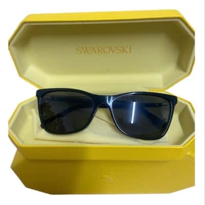 Swarovski Womens sunglasses yellow case  