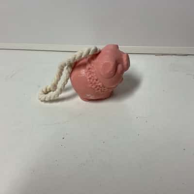 Vintage Avon pink pig soap on a rope