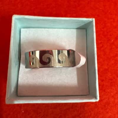  Women's / Unisex Stainless Steel Band Ring featuring a Wave Swirl Pattern