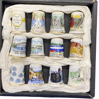 Set of 12 bone china thimbles. Australiana.