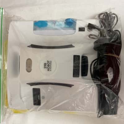 HOBOT 298 window cleaning robot designed with an ultrasonic spray nozzle.