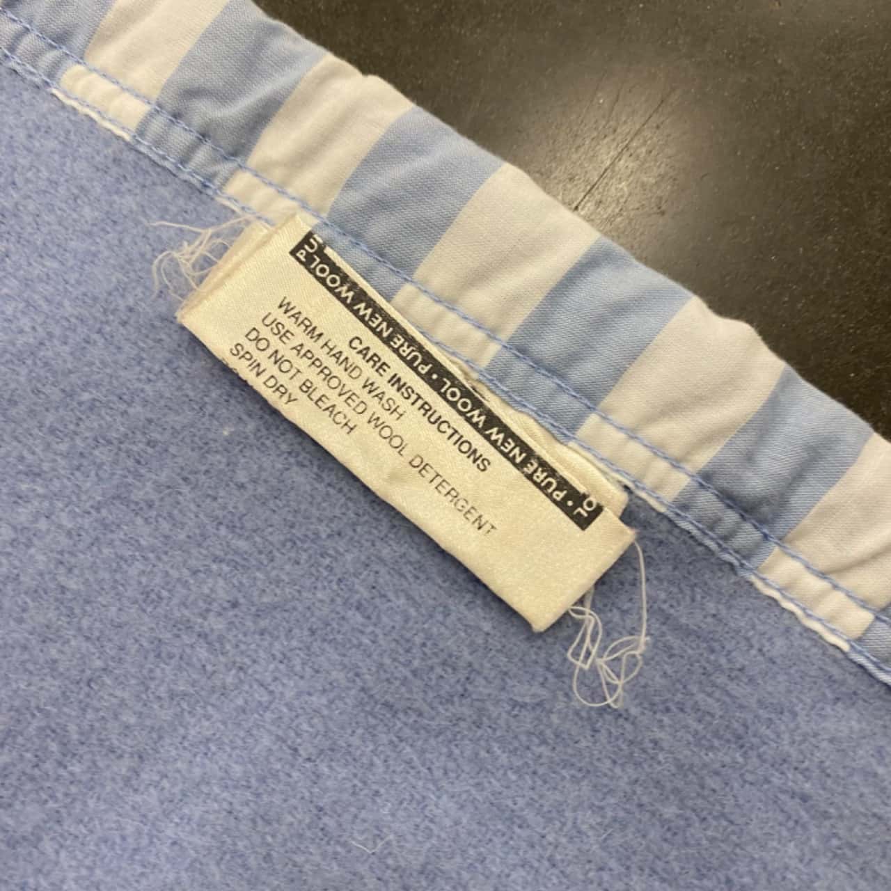 Onkaparinga. Light blue wool blanket with B1 & B2 (Bananas in Pyjamas