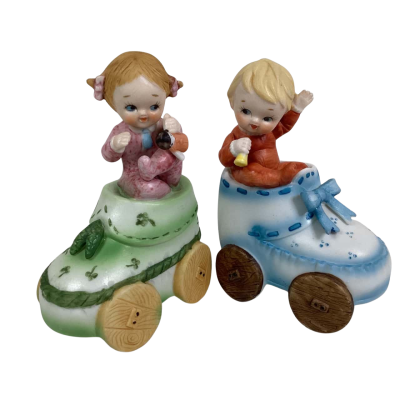 Vintage Bisque Boy and Girl in shoe Car.