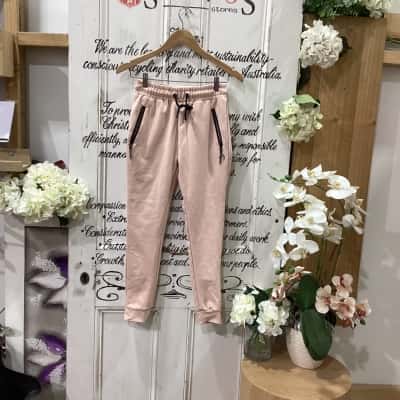 RYDERWEAR BRAND! Womens  Size XS Track Pants blush nude! BNWT! STUNNING TRACK PANTS WITH ZIP POCKETS! HAS LOGO THROUGH OUT! PERFECT BUTTERY SOFT PANTS! GREAT FOR LOUNGING AROUND OR WORKING OUT!