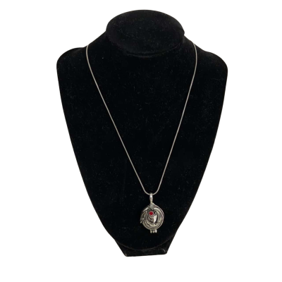 Replica of Elena Gilbert's Vervain Locket From the tv series : Vampire Diaries on a Silver Toned necklace. 