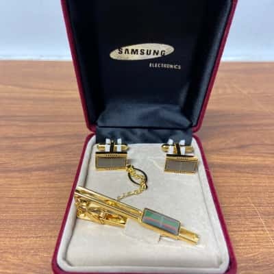 Gold-tone cufflinks and tie clip set