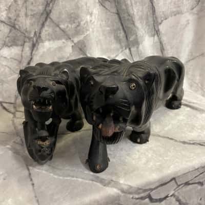Carved Ebony Lion Statues Pair