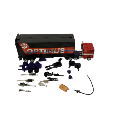 Generation 1 (G1) Optimus Prime Action Figure With Its Trailer & Accessories