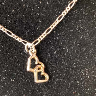  SILVER NECKLACE WITH PETITE INTERTWINED HEARTS 