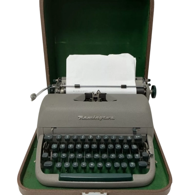  1950s Remington Rand Quiet-Riter Miracle Tab Typewriter Green.