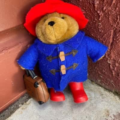 2006 Vintage Augusta du Bay Paddington Bear with suitcase, red hat and boots.