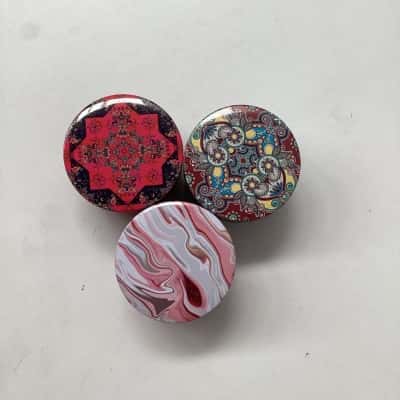 3 scented candles: Rose Jasmine and strawberry scented. 