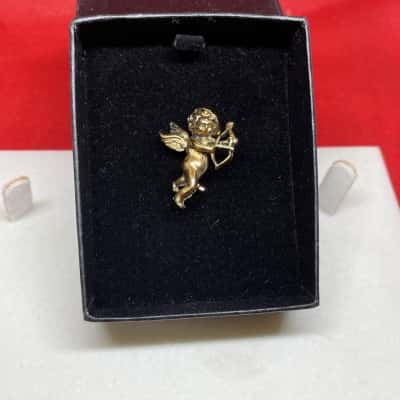  Womens Brooch yellow metal Cupid