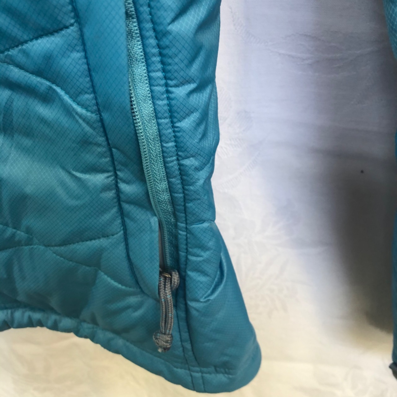blue kathmandu puffer jacket
