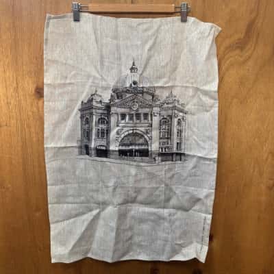 Flinders St Station by Emma Stevens Tea Towel 