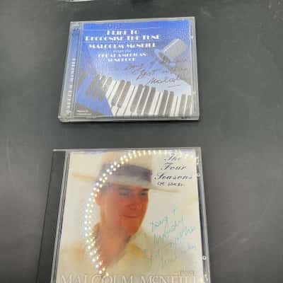 2 Malcom McNeill Signed CD’s 