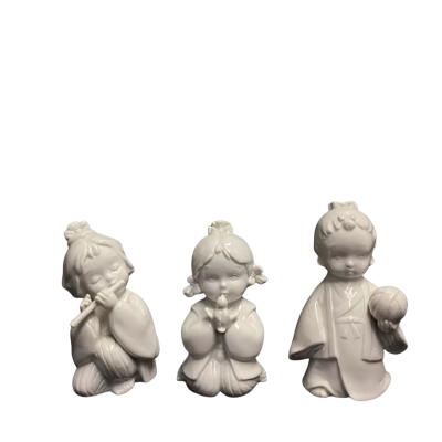 Porcelain Statue Trio