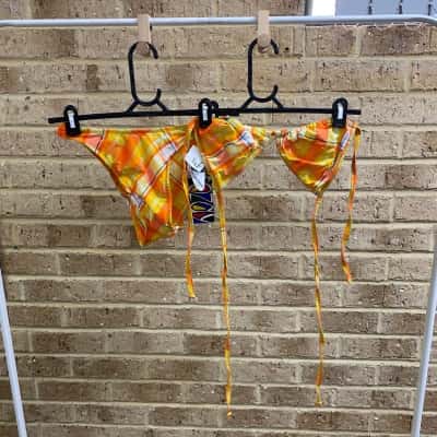  Womens Lycra yellow & orange set Size 12 