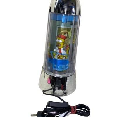 vintage 2002 Simpsons motion lamp featuring characters like Mr. Burns and Lisa.