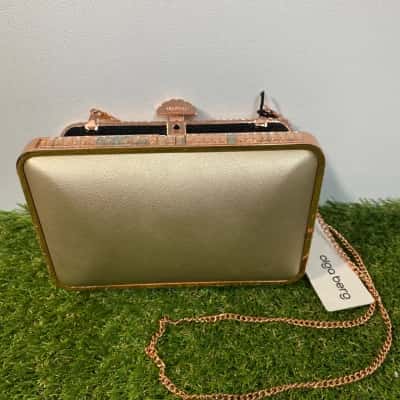 Womens metallic rose gold clutch