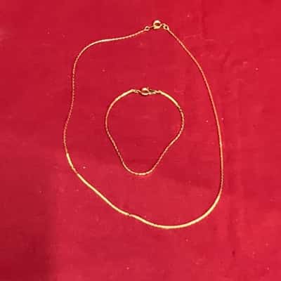  Women's gold toned Bracelet and Necklace 