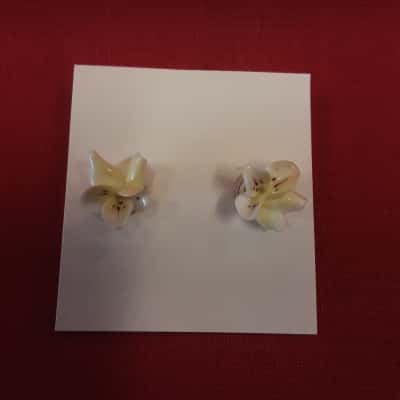 Feminine porcelain frangipani stud earrings