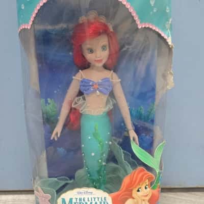 The little mermaid porcelain doll brass key