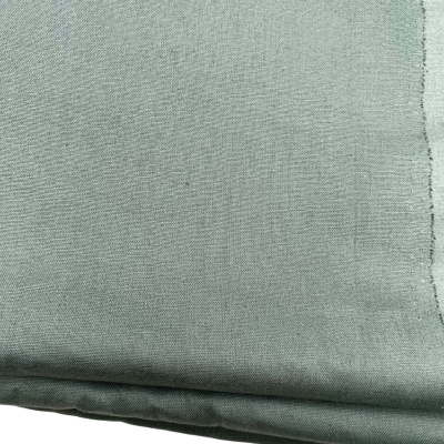 Green mixed fibre fabric.  110 (w) x 600 (L) cm approx.