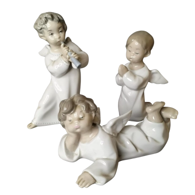 Lladro Set of Angels Handmade Antique Glazed Porcelain Sculpture. Playing, Resting and Playing.