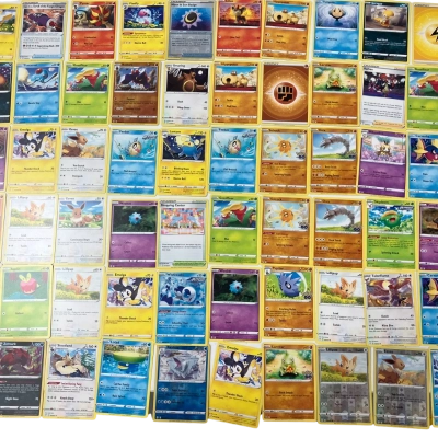 Pokémon trading cards 60pck & Empty Tin 
