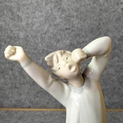 Lladro - Boy Awaking #4870. Designed by Fulgencio Garcia, issued in 1974 until 2000. 20 cm. Tall approx. In the Box.