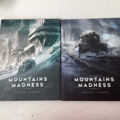 At the Mountains of madness  volumes 1 and 2 of the illustrated edition of H.P. Lovecrafts Novella books. 