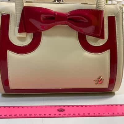 Women’s Cream with red trim handbag Alannah Hill