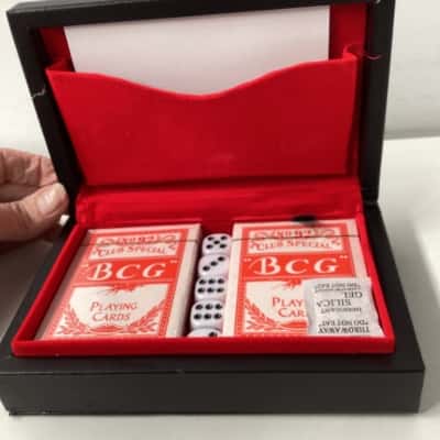 Boxed playing cards and dice